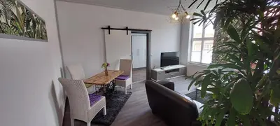 Ein Sitzbereich in der Unterkunft Modernes wohnen im alten Beelitz Wohnung 2