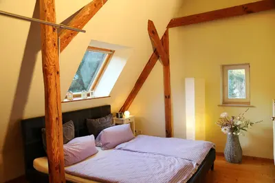 Ein Bett oder Betten in einem Zimmer der Unterkunft Maisonette