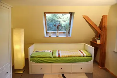Ein Bett oder Betten in einem Zimmer der Unterkunft Maisonette