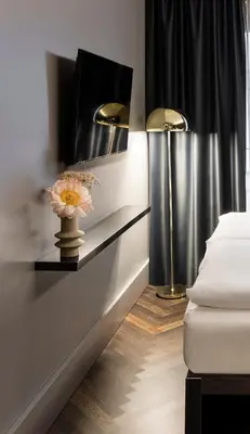 Ein Bett oder Betten in einem Zimmer der Unterkunft Hotel ROMY by AMANO