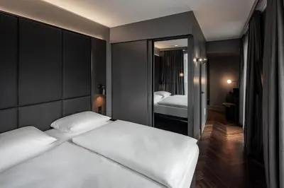 Ein Bett oder Betten in einem Zimmer der Unterkunft Hotel ROMY by AMANO