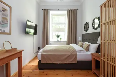 Ein Bett oder Betten in einem Zimmer der Unterkunft 4 Personen Altbau nahe Kurfürstendamm - Othello