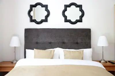 Ein Bett oder Betten in einem Zimmer der Unterkunft 4 Personen Altbau nahe Kurfürstendamm - Othello