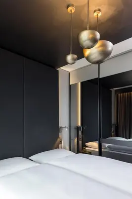 Ein Bett oder Betten in einem Zimmer der Unterkunft Hotel AMANO East Side