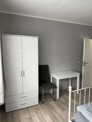 Ein Bett oder Betten in einem Zimmer der Unterkunft Haus zur Sonne