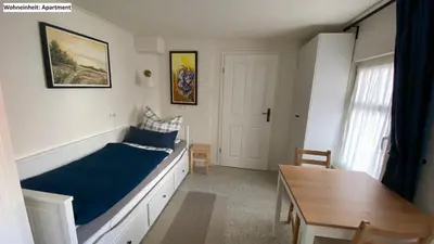 Ein Bett oder Betten in einem Zimmer der Unterkunft Blaue Perle Templin