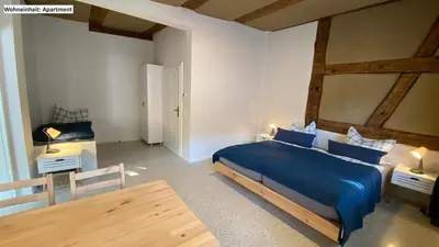 Ein Bett oder Betten in einem Zimmer der Unterkunft Blaue Perle Templin