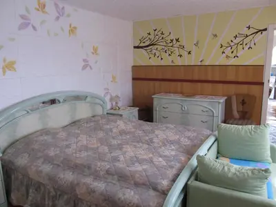 Ein Bett oder Betten in einem Zimmer der Unterkunft zum Wiesengrund im Oderbruch