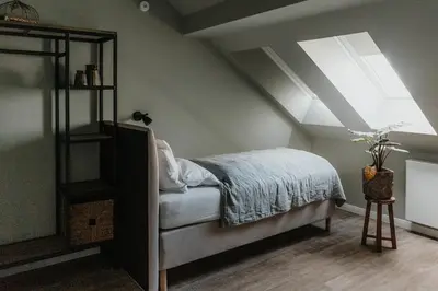 Ein Bett oder Betten in einem Zimmer der Unterkunft HÖNOW HOTEL