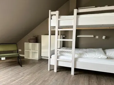 Ein Bett oder Betten in einem Zimmer der Unterkunft HÖNOW HOTEL