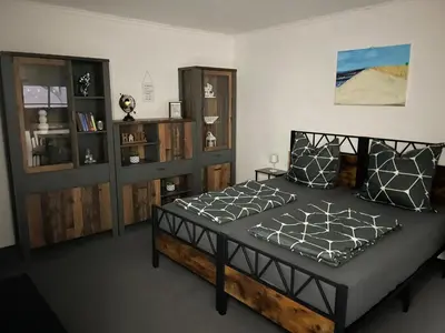 Ein Bett oder Betten in einem Zimmer der Unterkunft Ferienhaus Weise