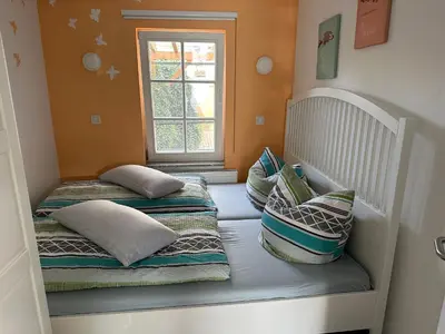 Ein Bett oder Betten in einem Zimmer der Unterkunft Smart Home - Die etwas andere Ferienwohnung!