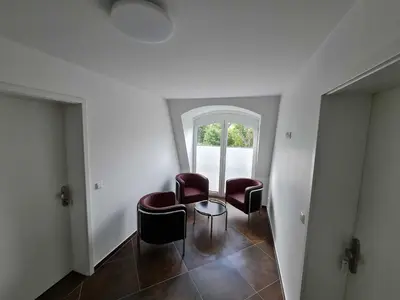 Ein Sitzbereich in der Unterkunft Villa-Dohne