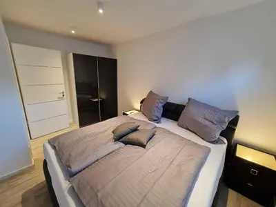 Ein Bett oder Betten in einem Zimmer der Unterkunft Villa-Dohne