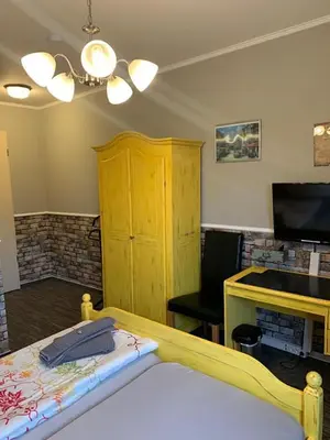 Ein Bett oder Betten in einem Zimmer der Unterkunft Hotel Auberge Restaurant