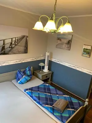 Ein Bett oder Betten in einem Zimmer der Unterkunft Hotel Auberge Restaurant