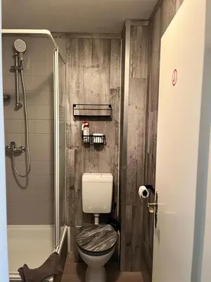 Ein Badezimmer in der Unterkunft Hotel Auberge Restaurant