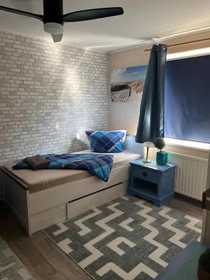 Ein Bett oder Betten in einem Zimmer der Unterkunft Hotel Auberge Restaurant