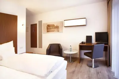 Ein Bett oder Betten in einem Zimmer der Unterkunft Springbach-Mühle Belzig