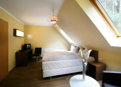 Ein Bett oder Betten in einem Zimmer der Unterkunft Springbach-Mühle Belzig