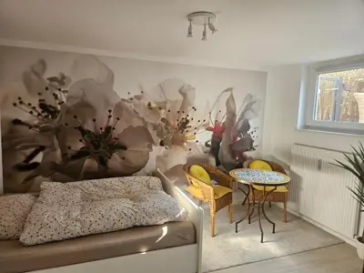Ein Sitzbereich in der Unterkunft 2 Zimmer-Einliegerwohnung am Flughafen Schönefeld