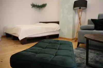 Ein Bett oder Betten in einem Zimmer der Unterkunft Apartment Lodge 61