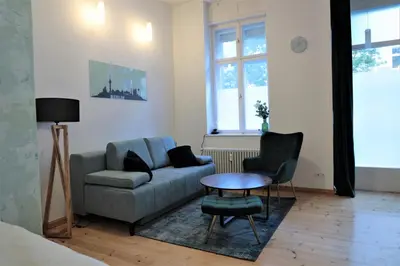 Ein Sitzbereich in der Unterkunft Apartment Lodge 61