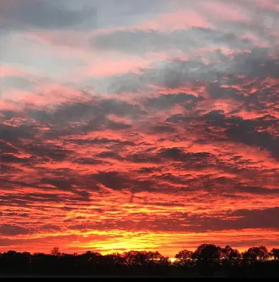 Blick auf den Sonnenuntergang/Sonnenaufgang von der Ferienwohnung aus oder aus der Nähe