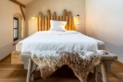Ein Bett oder Betten in einem Zimmer der Unterkunft Gut Leben Landresort