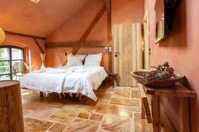 Ein Bett oder Betten in einem Zimmer der Unterkunft Gut Leben Landresort