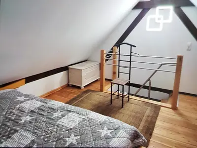 Ein Bett oder Betten in einem Zimmer der Unterkunft Ferienwohnung Schmenkel