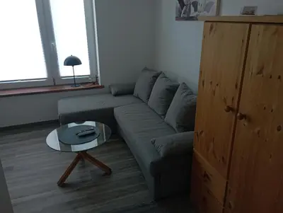 Ein Sitzbereich in der Unterkunft Ferienwohnung Schmenkel