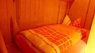 Ein Bett oder Betten in einem Zimmer der Unterkunft Amselgarten