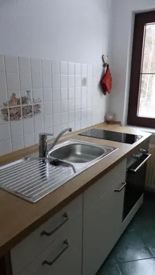 Küche/Küchenzeile in der Unterkunft Amselgarten