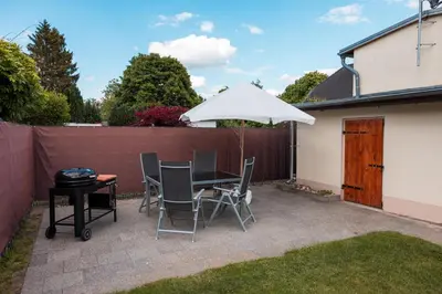 Ein Patio oder anderer Außenbereich in der Unterkunft Karowlina Cozy House Berlin 1-4 Person