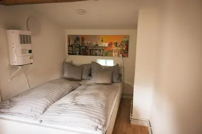 Ein Bett oder Betten in einem Zimmer der Unterkunft Karowlina Cozy House Berlin 1-4 Person