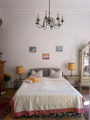 Ein Bett oder Betten in einem Zimmer der Unterkunft Kant