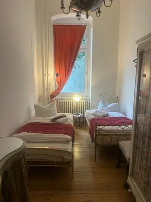 Ein Bett oder Betten in einem Zimmer der Unterkunft Kant