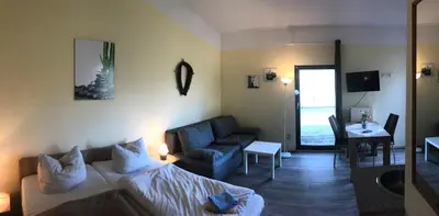 Ein Sitzbereich in der Unterkunft Museumsherberge Glashütte