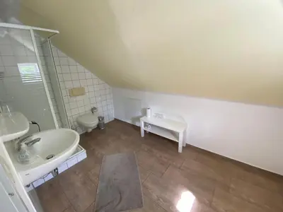 Ein Badezimmer in der Unterkunft Museumsherberge Glashütte