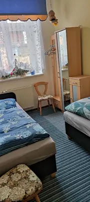 Ein Bett oder Betten in einem Zimmer der Unterkunft Ferienwohnung Marienkäfer