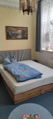 Ein Bett oder Betten in einem Zimmer der Unterkunft Ferienwohnung Marienkäfer
