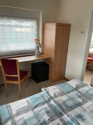 Ein Bett oder Betten in einem Zimmer der Unterkunft Ferienwohnung Arthur