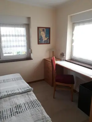 Ein Bett oder Betten in einem Zimmer der Unterkunft Ferienwohnung Arthur