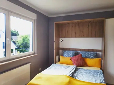 Ein Bett oder Betten in einem Zimmer der Unterkunft Mini-Apartment ruhig und verkehrsgünstig in Berlin
