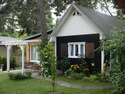 Ein Garten an der Unterkunft Ferienhaus Püttbergeweg, Berlin