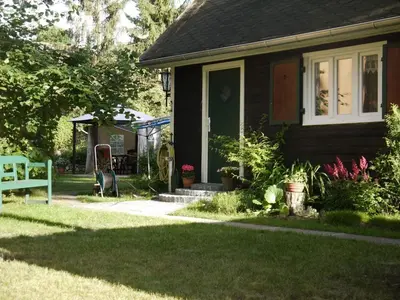 Ein Garten an der Unterkunft Ferienhaus Püttbergeweg, Berlin