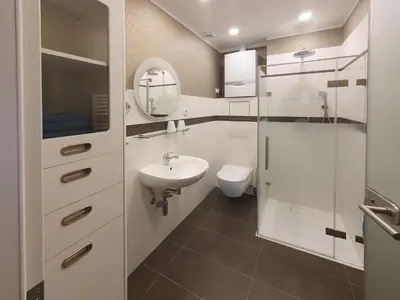 Ein Badezimmer in der Unterkunft Ferienhaus Püttbergeweg, Berlin