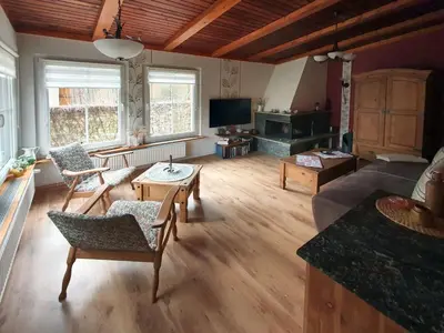 Ein Sitzbereich in der Unterkunft Ferienhaus Püttbergeweg, Berlin