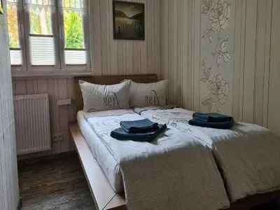 Ein Bett oder Betten in einem Zimmer der Unterkunft Ferienhaus Püttbergeweg, Berlin